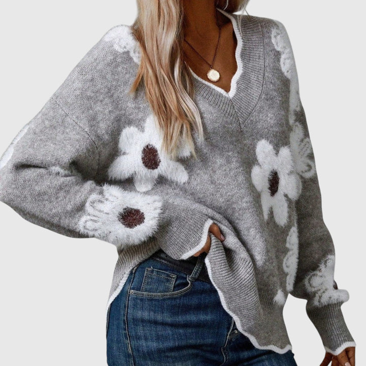 THEA - Elegáns V-nyakú pulóver virágmintával