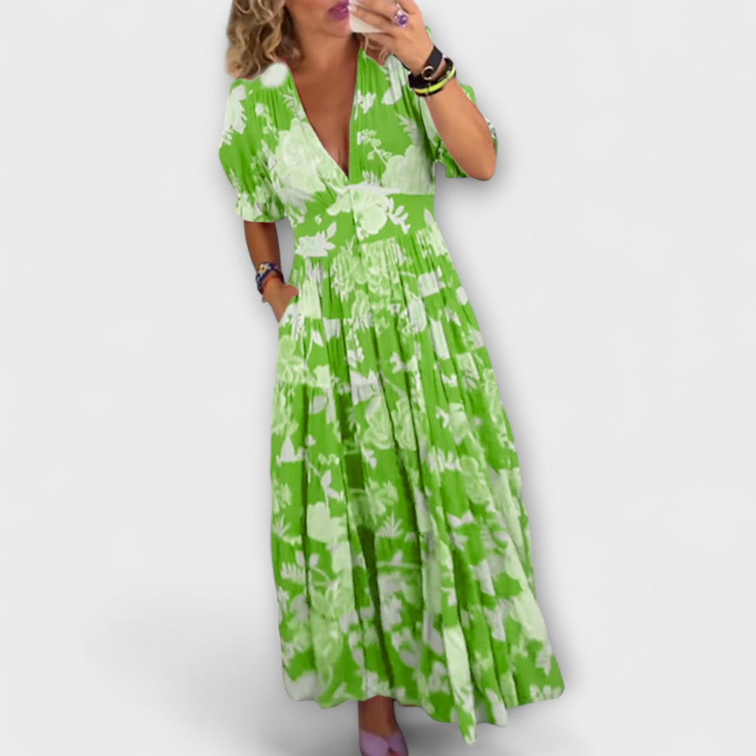 Catrisa - Virágmintás ruha V-nyakú kivágással és zsebekkel